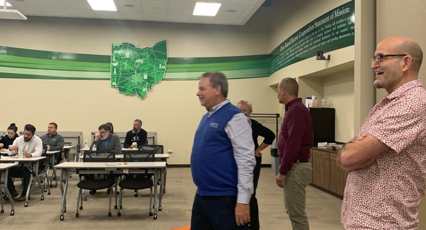 Two members of the OEC team competing in the cornhole tournament. 