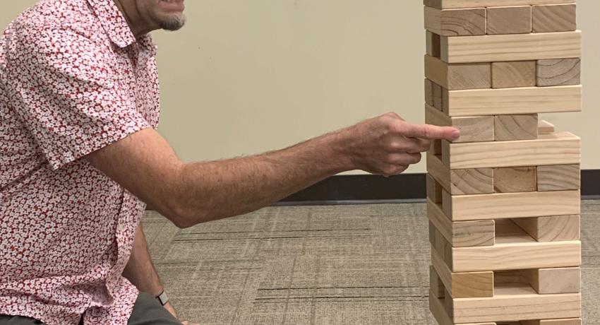 Jeff McCallister playing jumbo Jenga